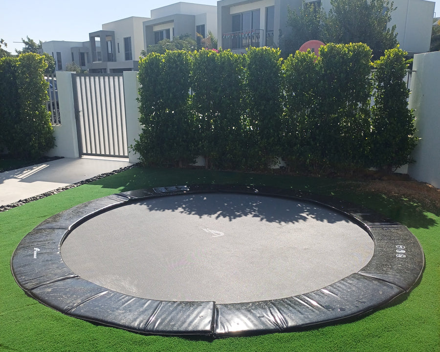 Primus_Flat_Round_Black_900x_7fc77037-9f40-4387-a27b-b2dae347be96.jpg Primus Flat 10ft Rectangular In Ground Akrobat Trampolines With Exclusive Warranty and Extreme Bounce - Without net - Image 6